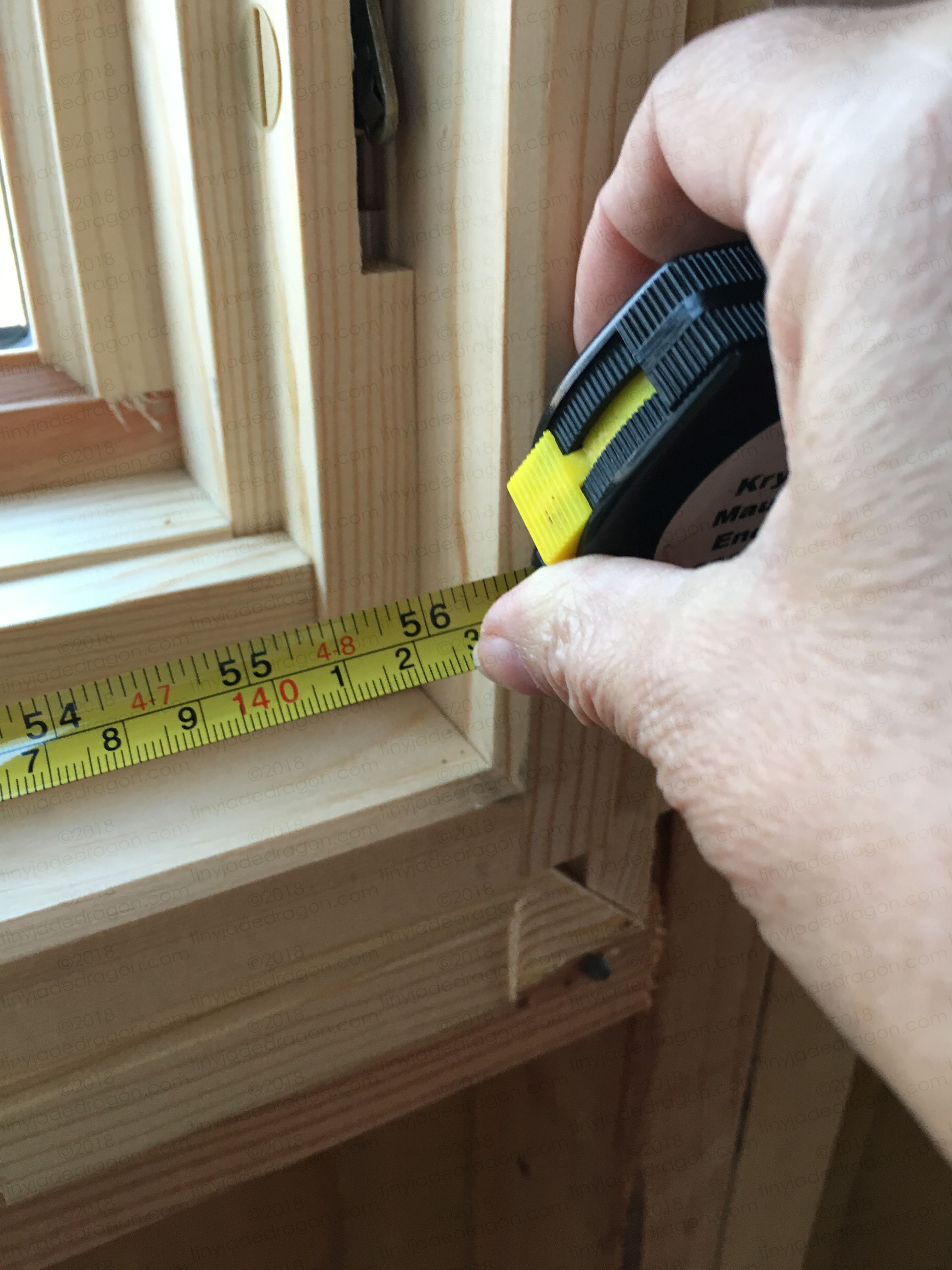Hand with Measuring Tape